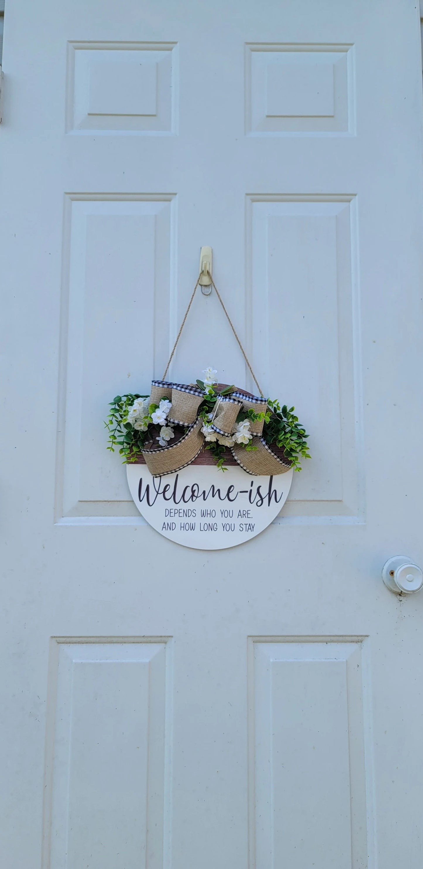 Welcome-ish wood door sign