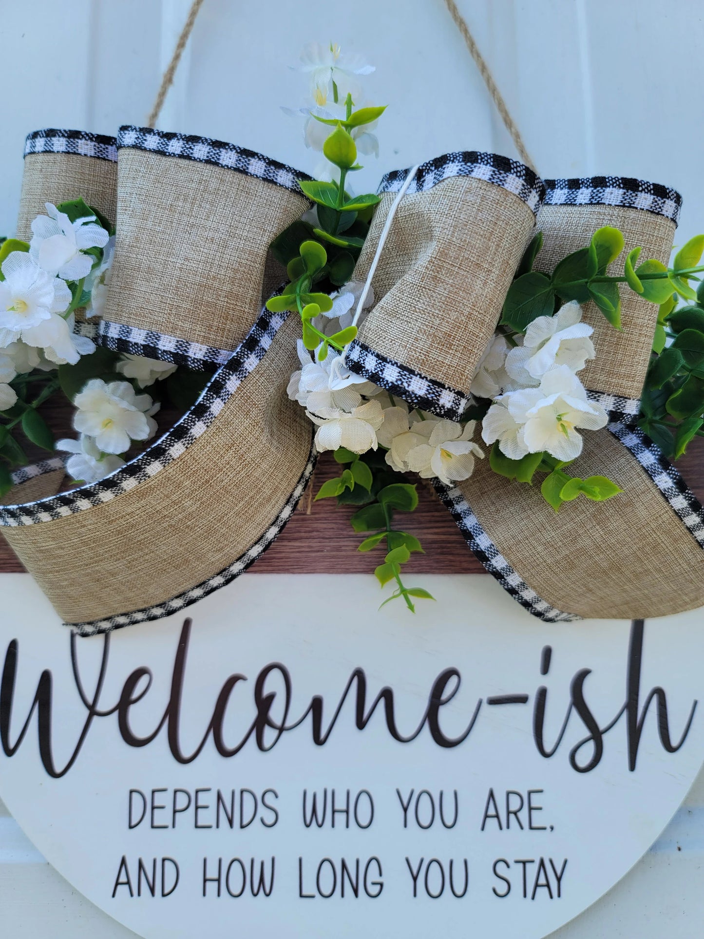 Welcome-ish wood door sign